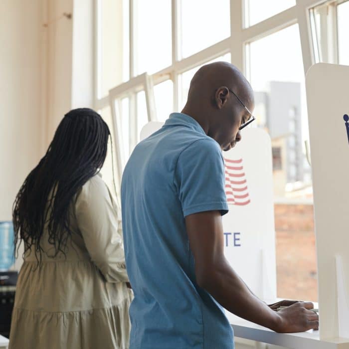 African-American People in Voting Booth